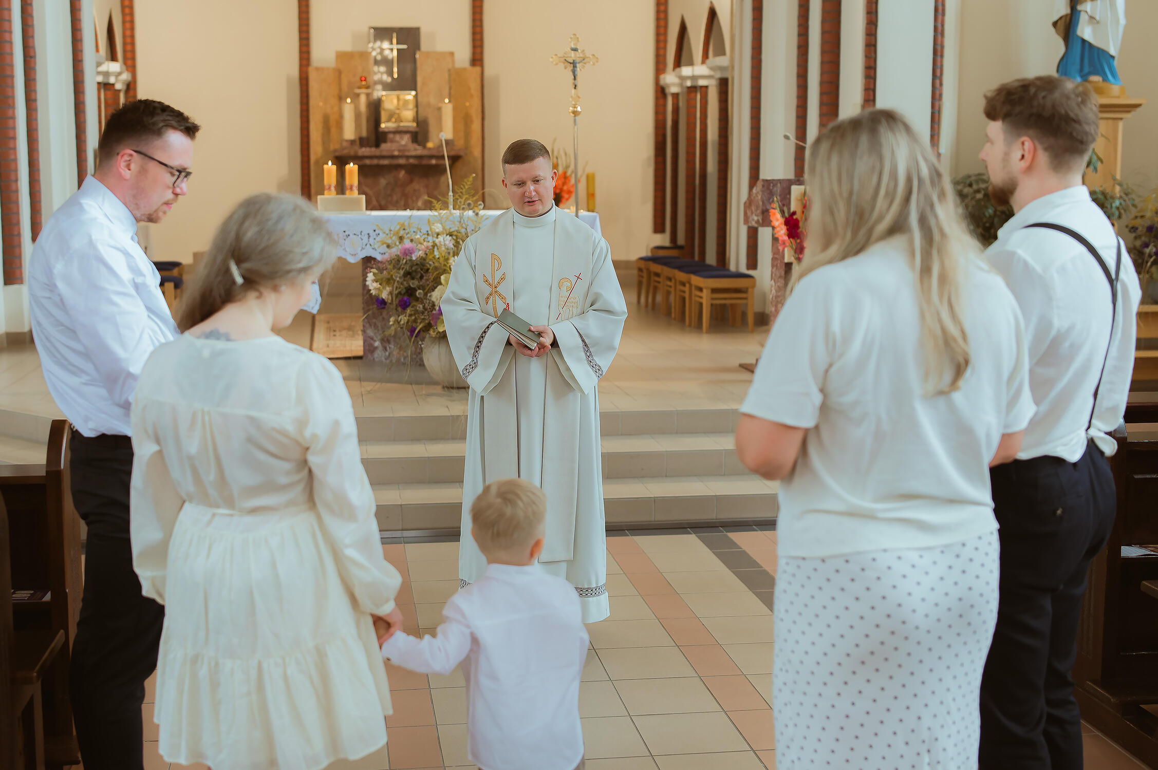 Untitled Reportažinis krikšto apeigų fotografavimas